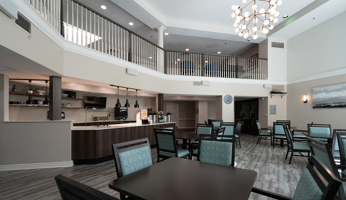 dining room in a senior living community, featuring tables set