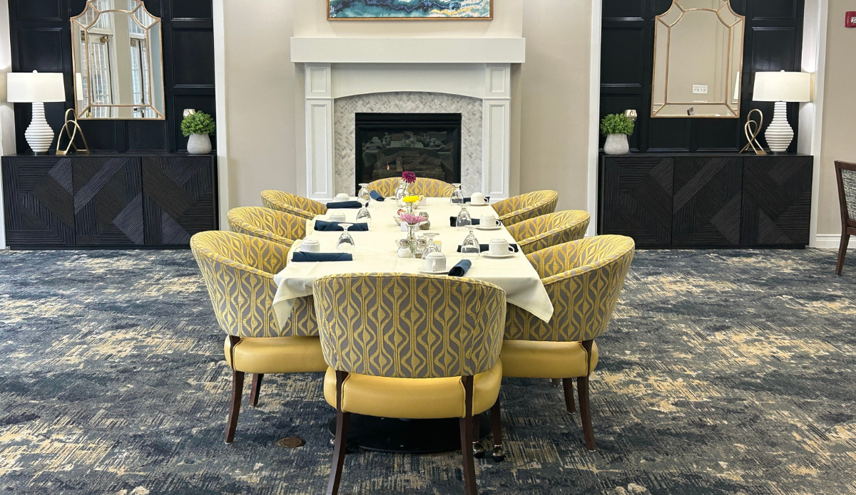 Dining area with long table and chairs